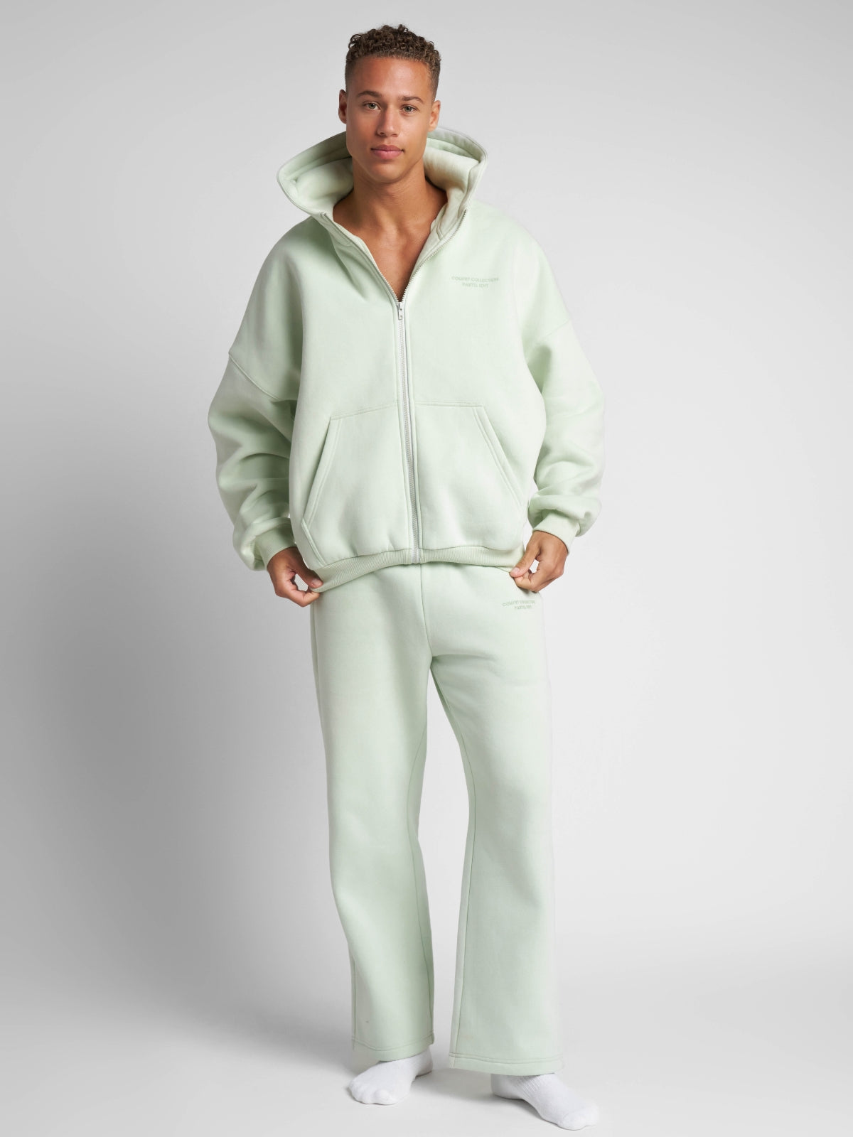 Sudadera con Capucha de Cremallera en Color Pastel